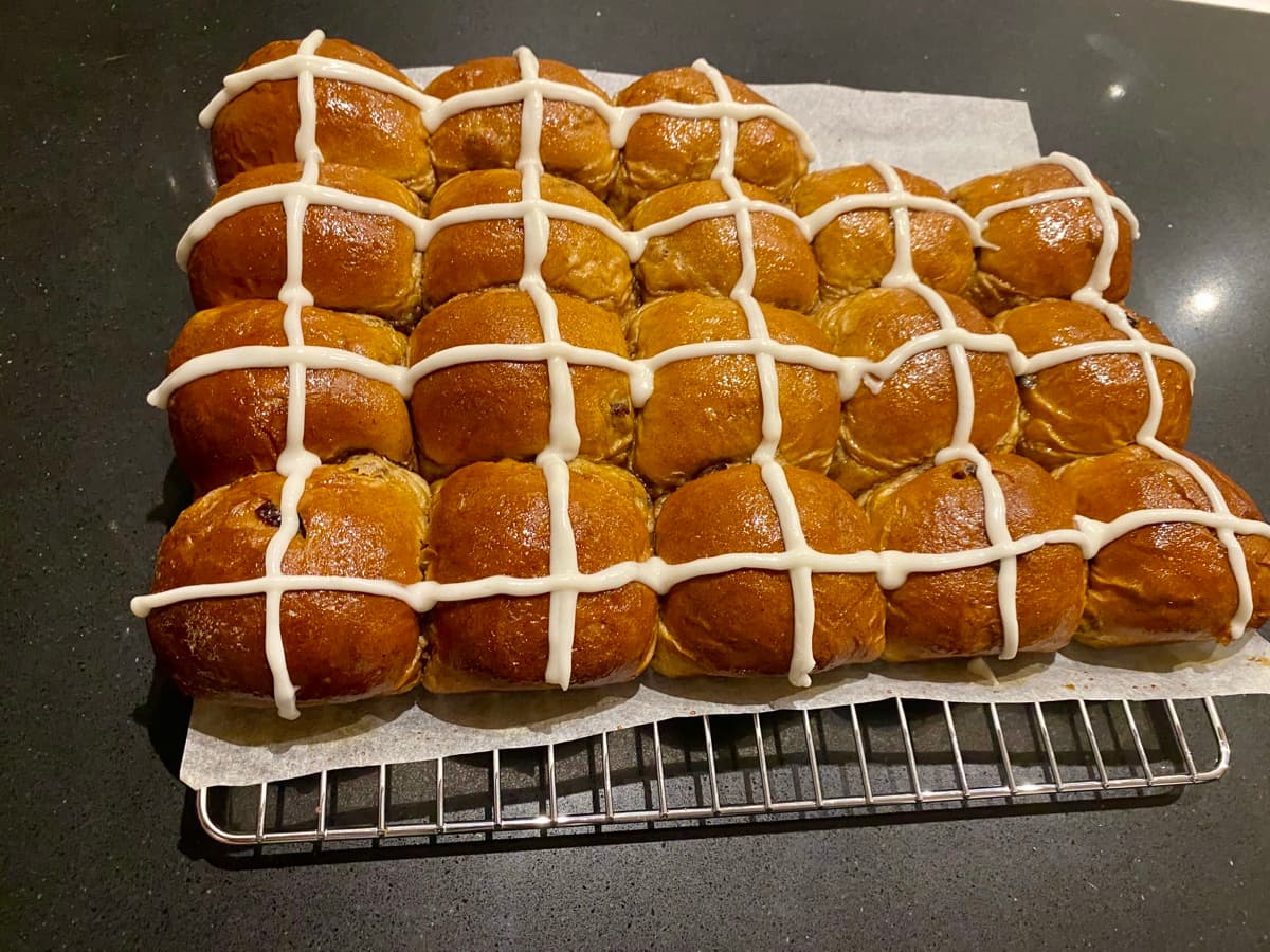 Tray of glazed hot cross buns